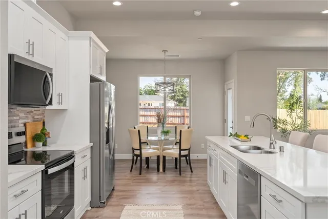 a kitchen with sink cabinets and counter space