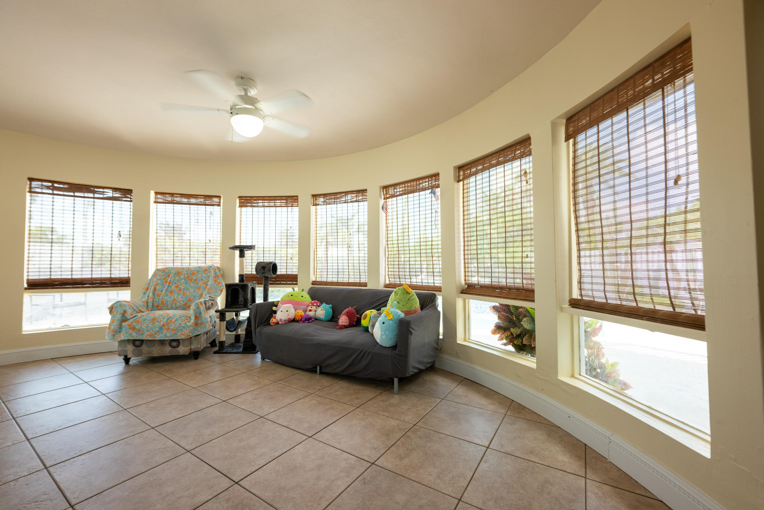 1229 5th Street Key West, FL 33040 - Photo 30 of 40 a living room with furniture and large windows