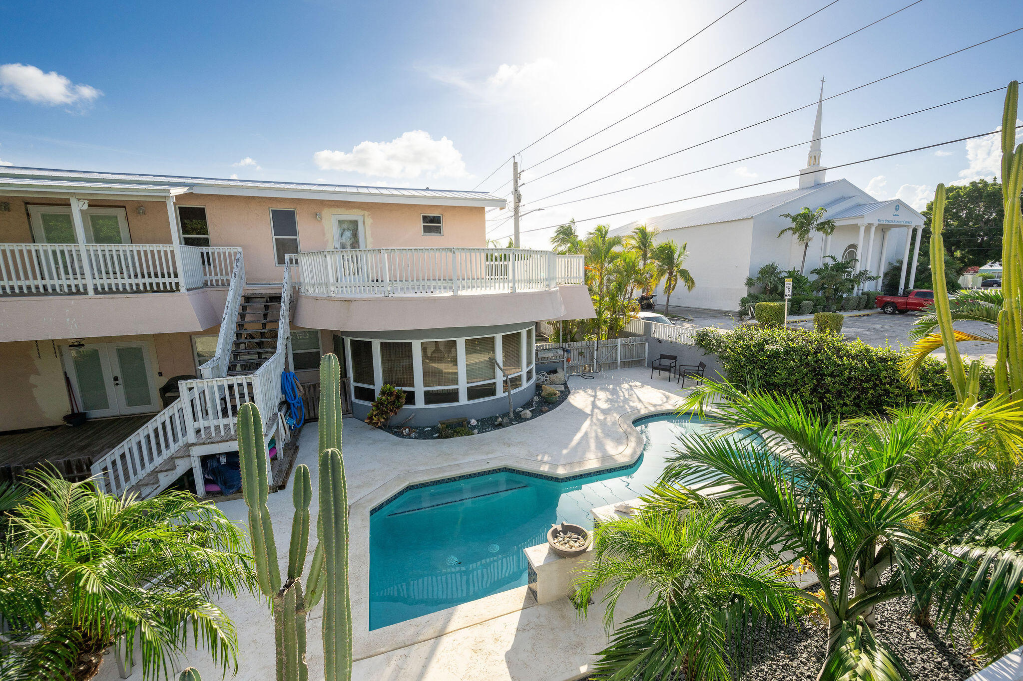 1229 5th Street Key West, FL 33040 - Photo 31 of 40 a view of a house with a patio