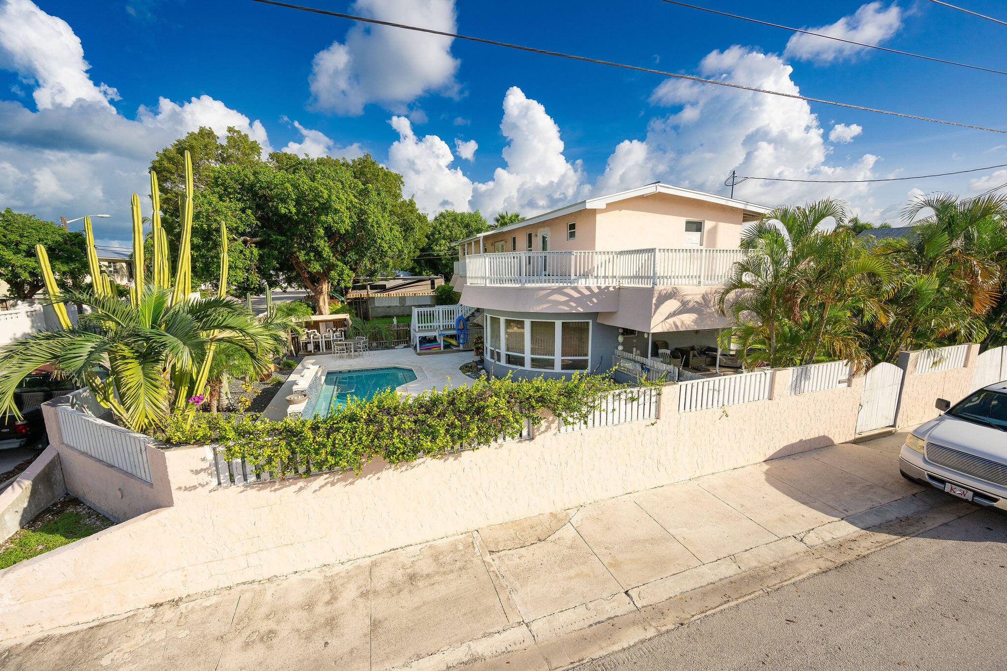 1229 5th Street Key West, FL 33040 - Photo 33 of 40 a view of a house with swimming pool