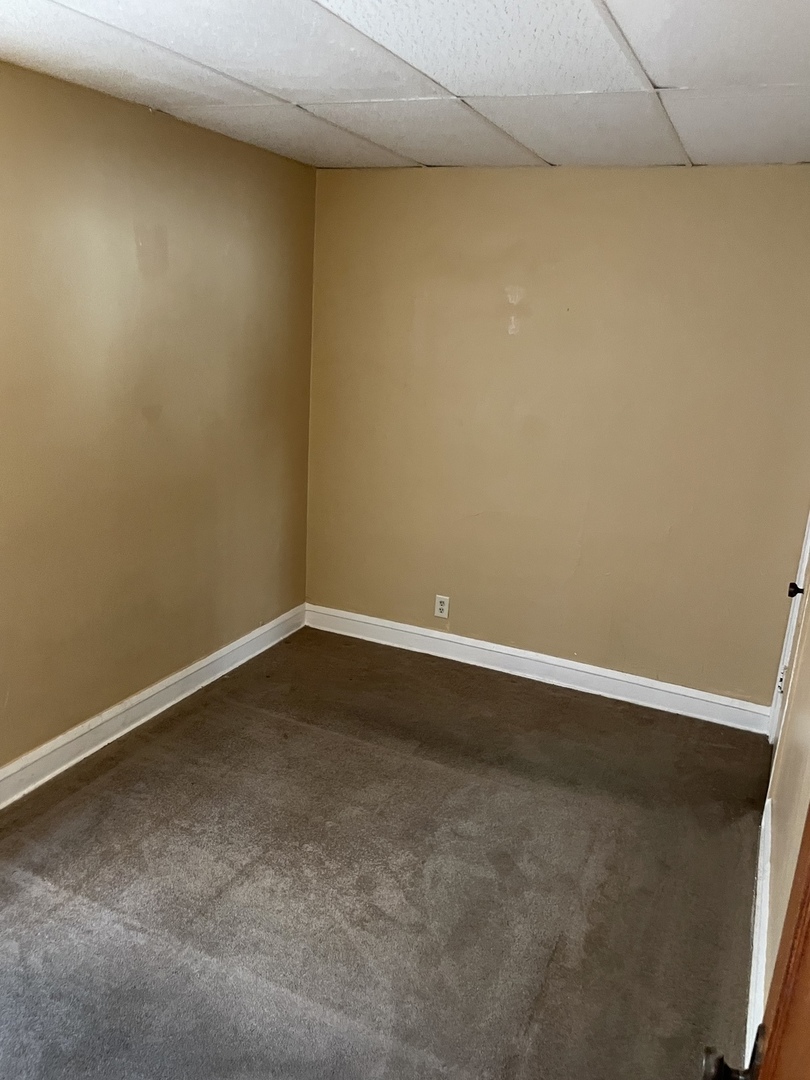 9309 South Ada Street Chicago, IL 60620 - Photo 17 of 39 a view of an empty room