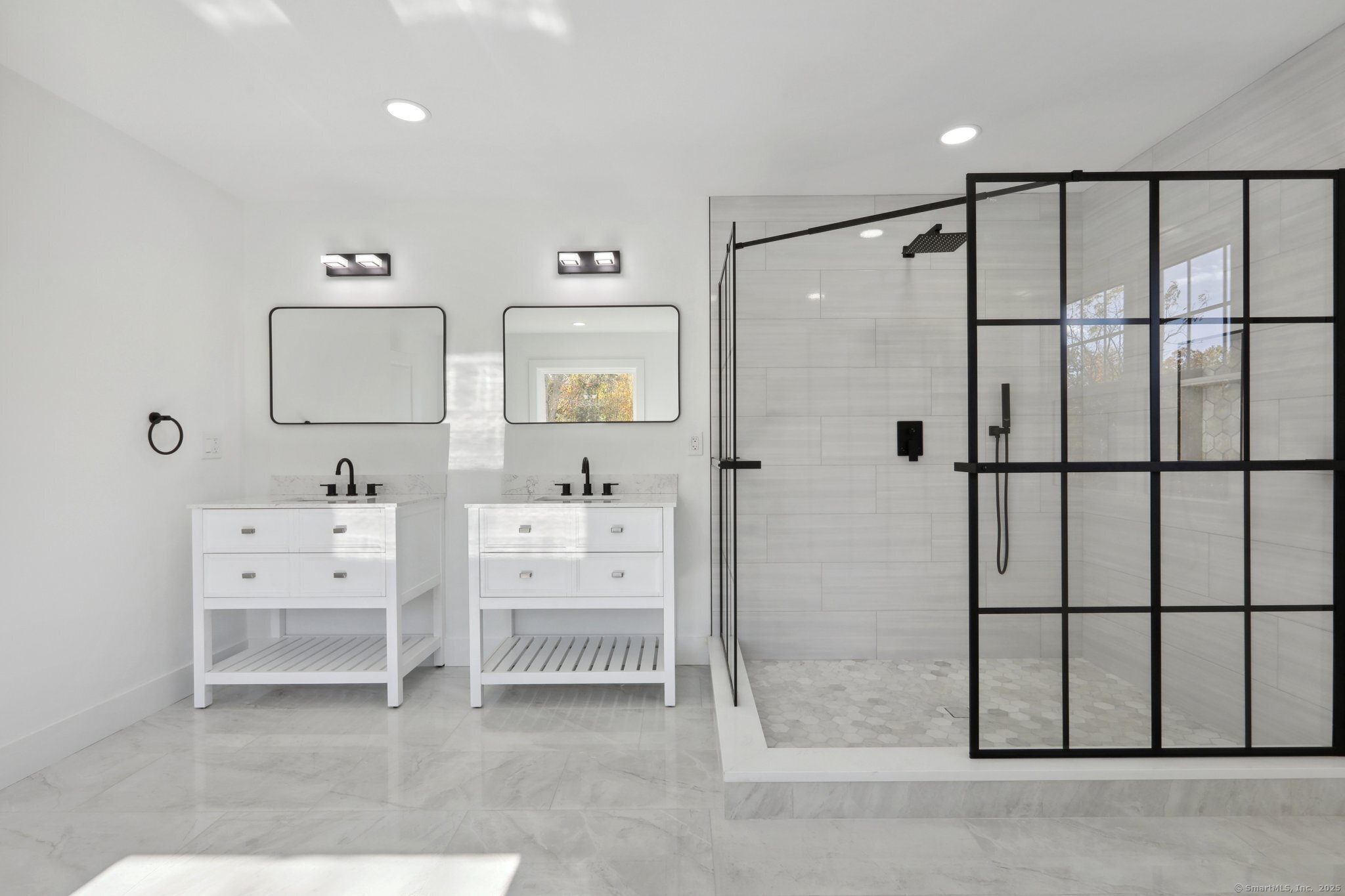 19 A Apache Drive Brookfield, CT 06804 - Photo 19 of 28 a bathroom with a double vanity sink toilet and shower