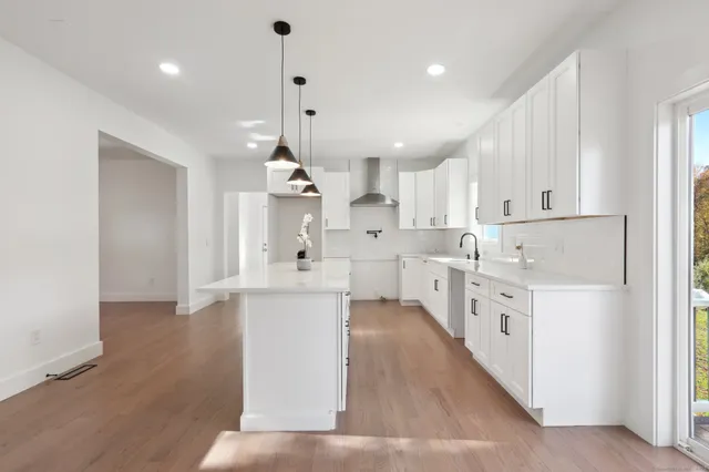 a large kitchen with cabinets