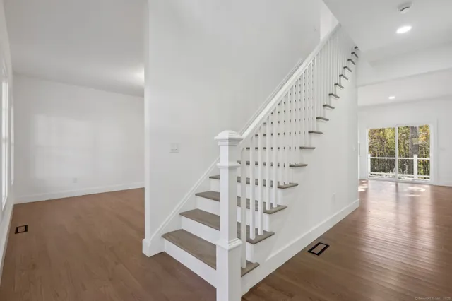 a view of entryway with wooden floor