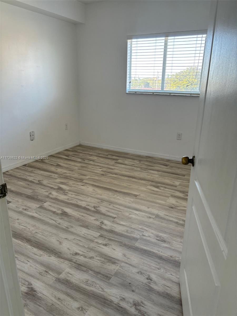 West Flagler Miami, FL 33125 - Photo 7 of 11 a view of a room that has a window