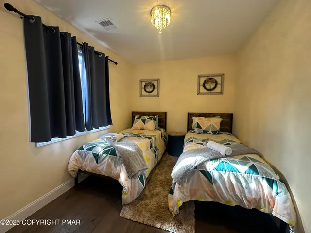 a view of a lake with a beach