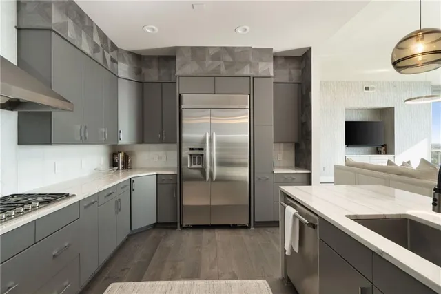 a work room with furniture and a floor to ceiling window