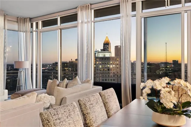 a kitchen with a sink stainless steel appliances and cabinets