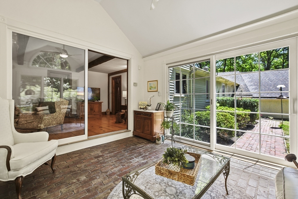 40 Herrick Road Boxford, MA 01921 - Photo 12 of 40 a living room with furniture tv and a window