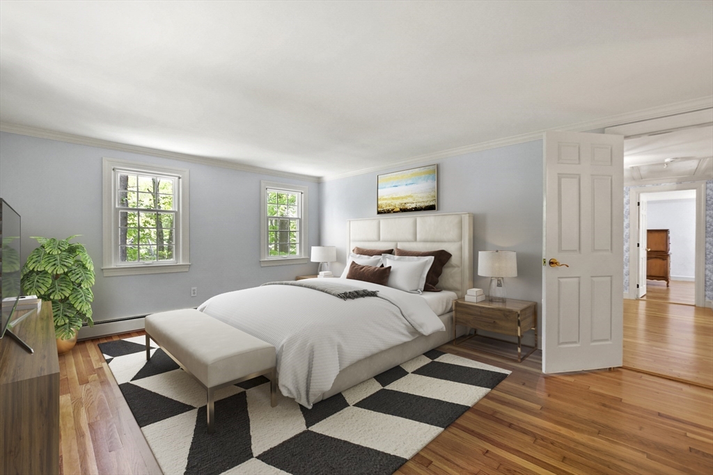 40 Herrick Road Boxford, MA 01921 - Photo 20 of 40 a bedroom with a bed and wooden floor