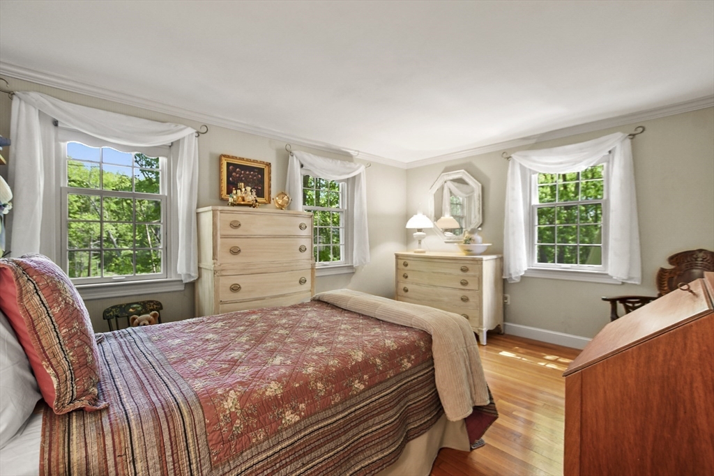 40 Herrick Road Boxford, MA 01921 - Photo 25 of 40 a bedroom with a bed and a desk