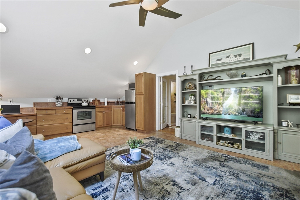 40 Herrick Road Boxford, MA 01921 - Photo 33 of 40 a living room with furniture and a flat screen tv