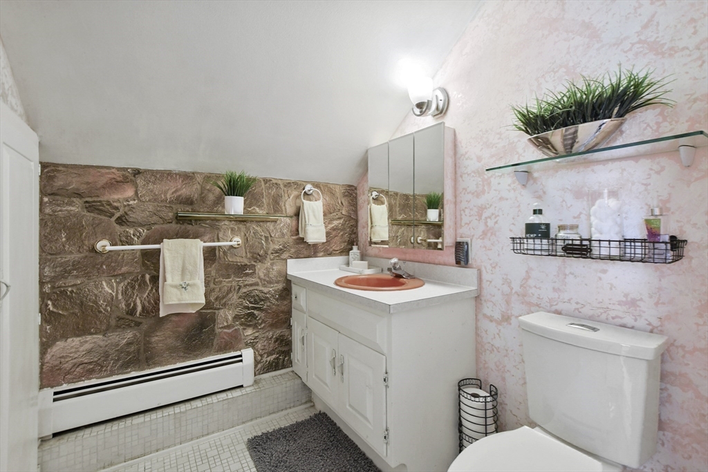 40 Herrick Road Boxford, MA 01921 - Photo 36 of 40 a bathroom with a sink a mirror and a toilet