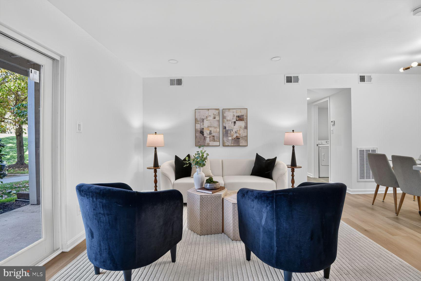 1732 Ascot Way, Unit 1732A Reston, VA 20190 - Photo 4 of 37 Living room with access to patio