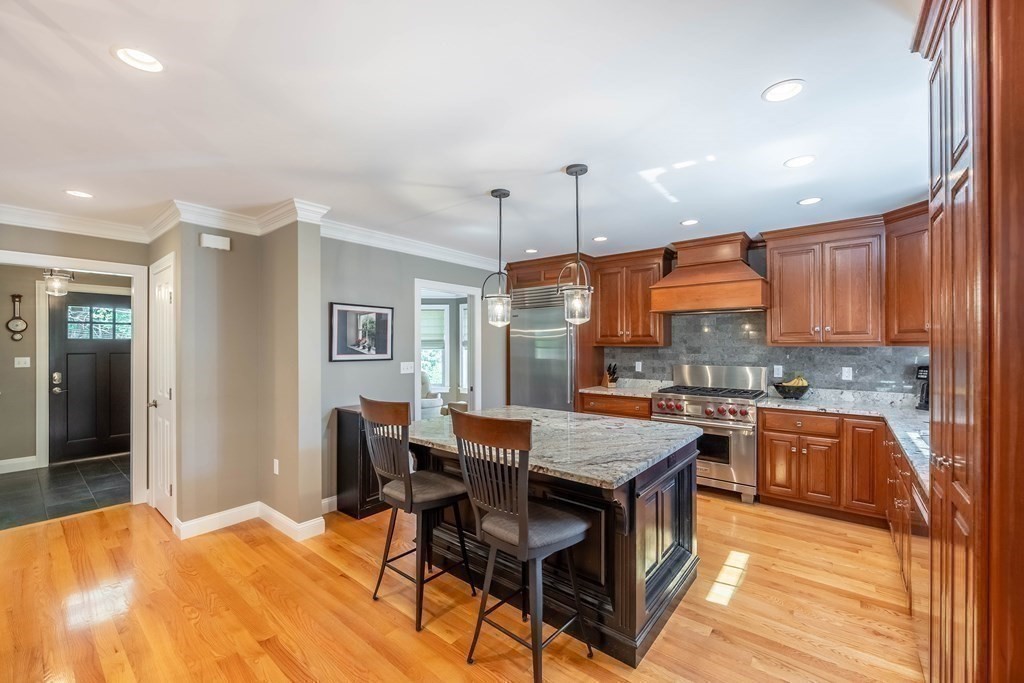 20 County Road Andover, MA 01810 - Photo 12 of 42 a dining hall with stainless steel appliances granite countertop a stove and a refrigerator