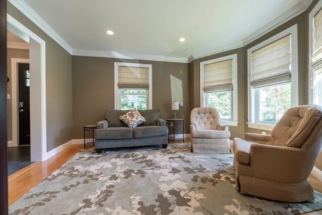 20 County Road Andover, MA 01810 - Photo 20 of 42 a living room with furniture and a large window