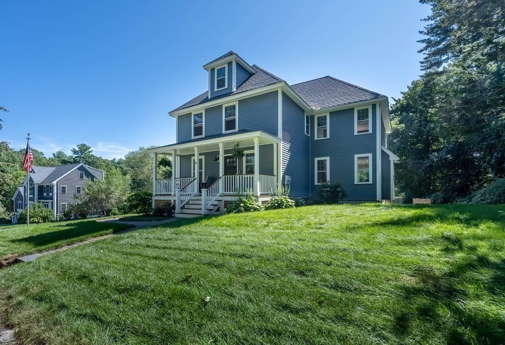 20 County Road Andover, MA 01810 - Photo 2 of 42 front view of a house with a garden