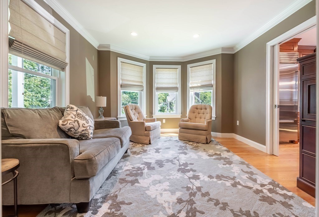 20 County Road Andover, MA 01810 - Photo 21 of 42 a living room with furniture and large windows