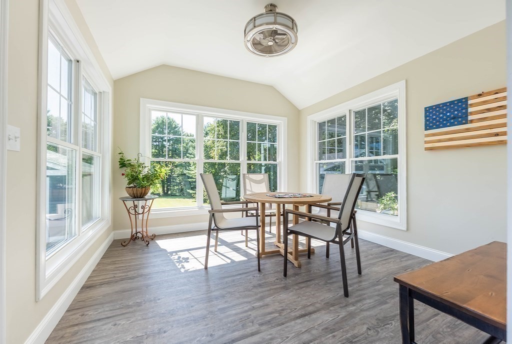 20 County Road Andover, MA 01810 - Photo 25 of 42 a view of a dining room with furniture window and wooden floor