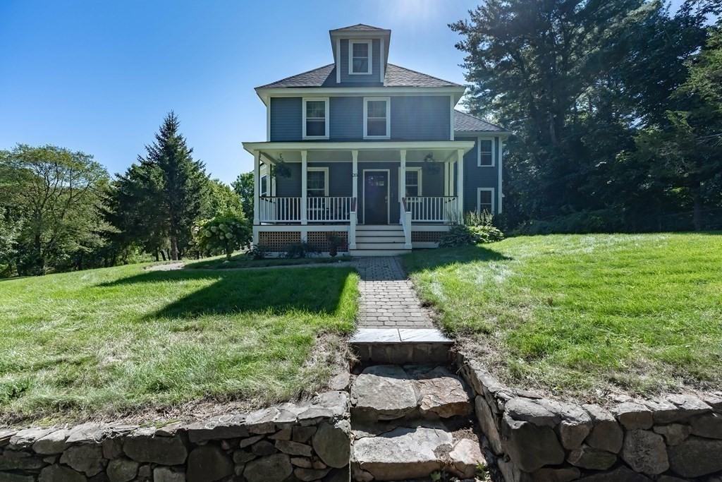 20 County Road Andover, MA 01810 - Photo 3 of 42 a front view of a house with a yard