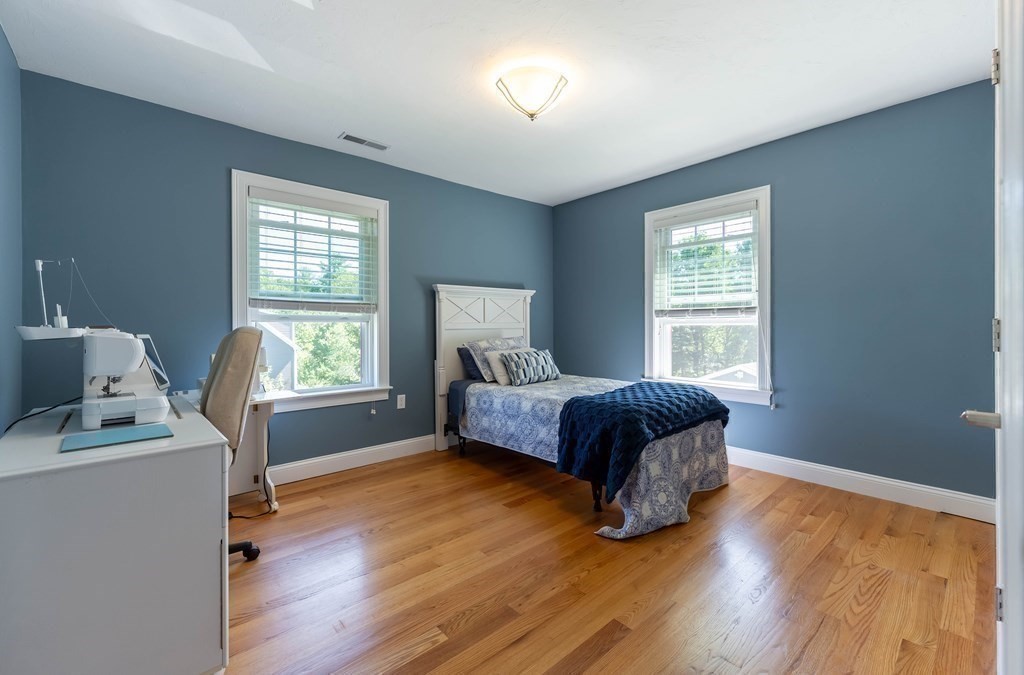 20 County Road Andover, MA 01810 - Photo 32 of 42 a bedroom with a bed and a window