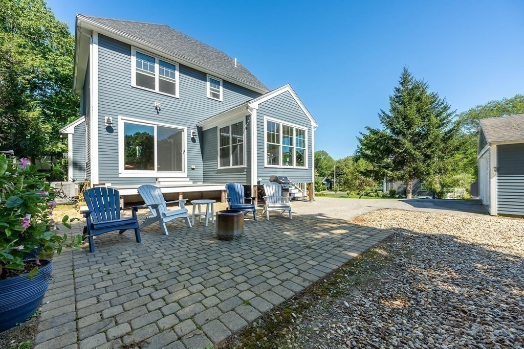20 County Road Andover, MA 01810 - Photo 35 of 42 a view of a house with backyard and sitting area