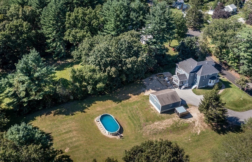 20 County Road Andover, MA 01810 - Photo 40 of 42 an aerial view of a house with a yard and lake view