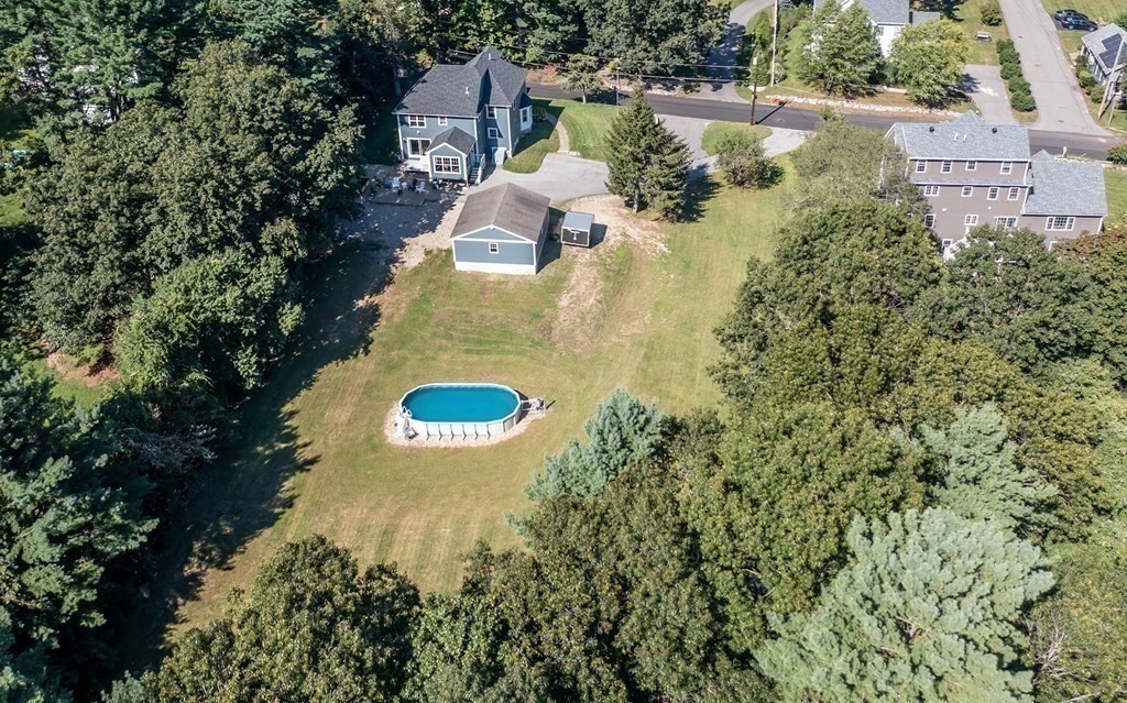 20 County Road Andover, MA 01810 - Photo 41 of 42 an aerial view of a house with a yard and lake view