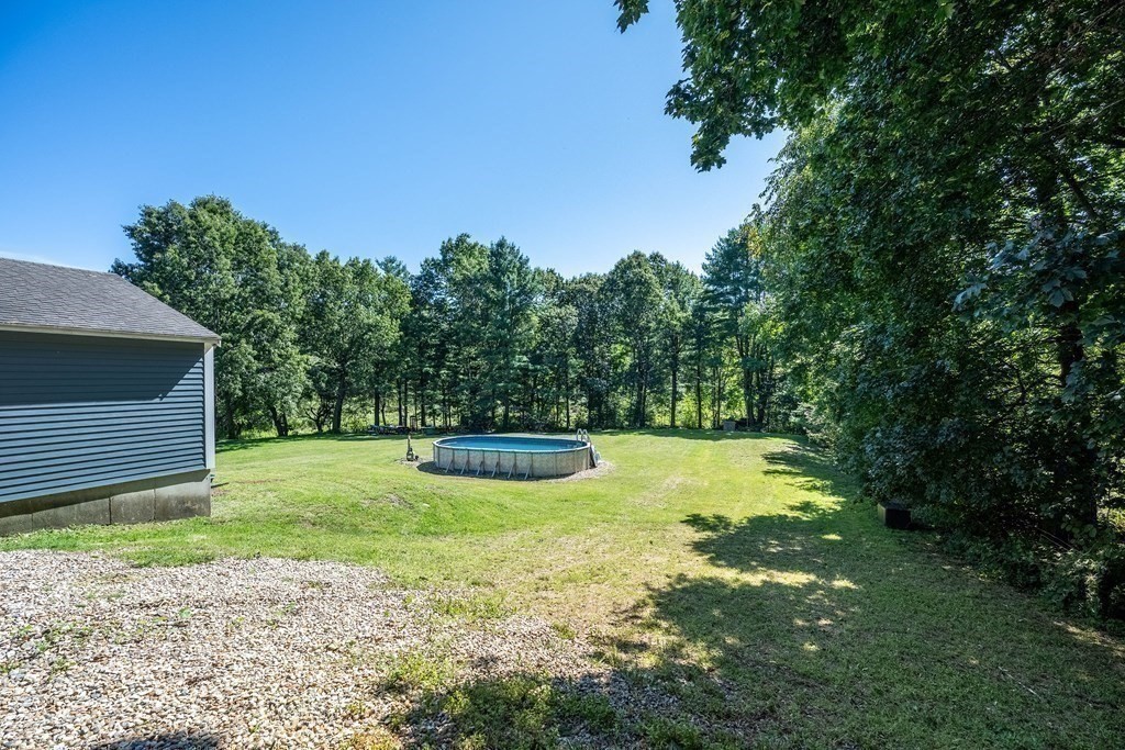 20 County Road Andover, MA 01810 - Photo 42 of 42 a view of a backyard with large trees