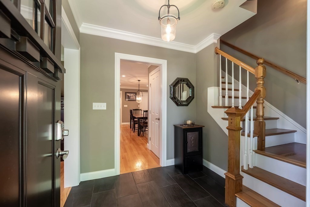 20 County Road Andover, MA 01810 - Photo 6 of 42 a view of hallway with stairs and wooden floor