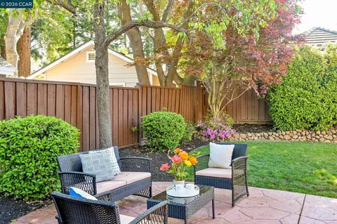 a garden view with a seating space