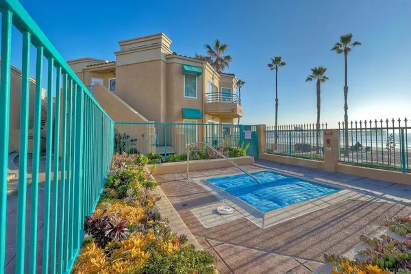 a view of a backyard with sitting area