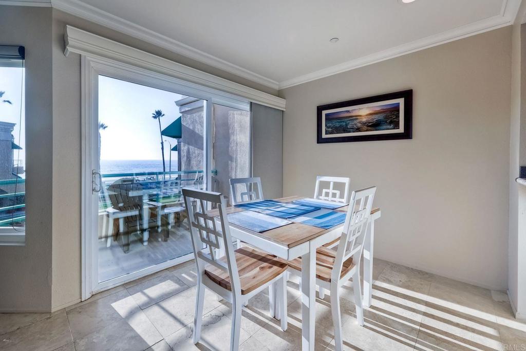 400 The Strand North, Unit 18 Oceanside, CA 92054 - Photo 2 of 19 a view of a dining room with furniture