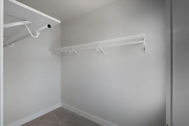 a view of a room with racks on the wall