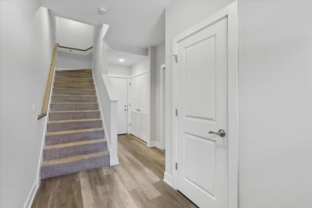 a view of entryway with wooden floor