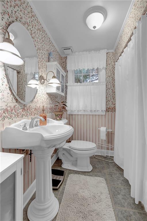 1400 Market Street Beaver, PA 15009 - Photo 11 of 23 a bathroom with a sink a toilet and shower