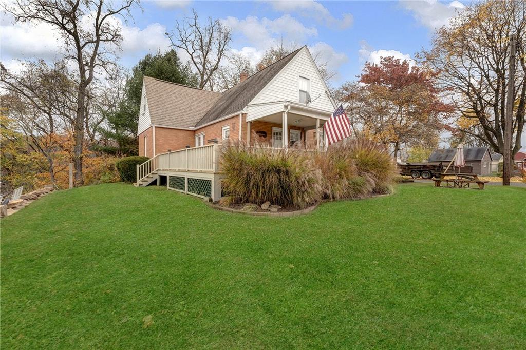 1400 Market Street Beaver, PA 15009 - Photo 19 of 23 a front view of house with yard and green space
