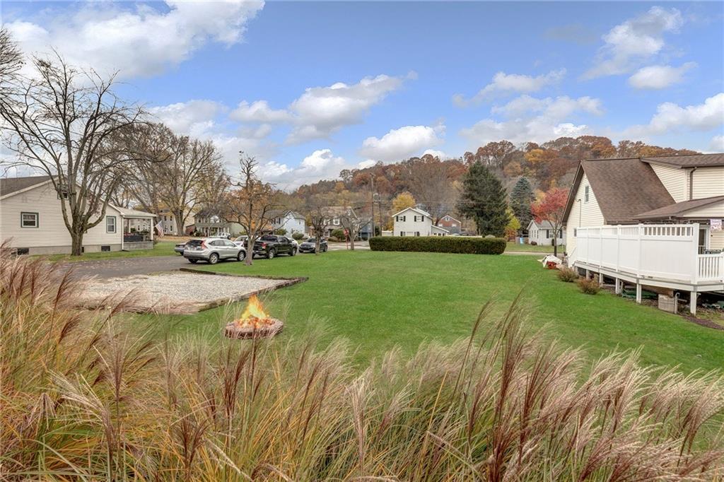1400 Market Street Beaver, PA 15009 - Photo 22 of 23 a view of yard with swimming pool and green space