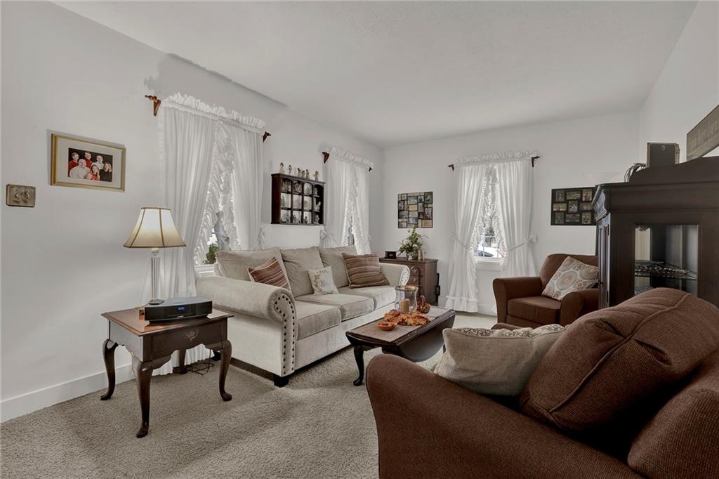 1400 Market Street Beaver, PA 15009 - Photo 8 of 23 a living room with furniture and a fireplace