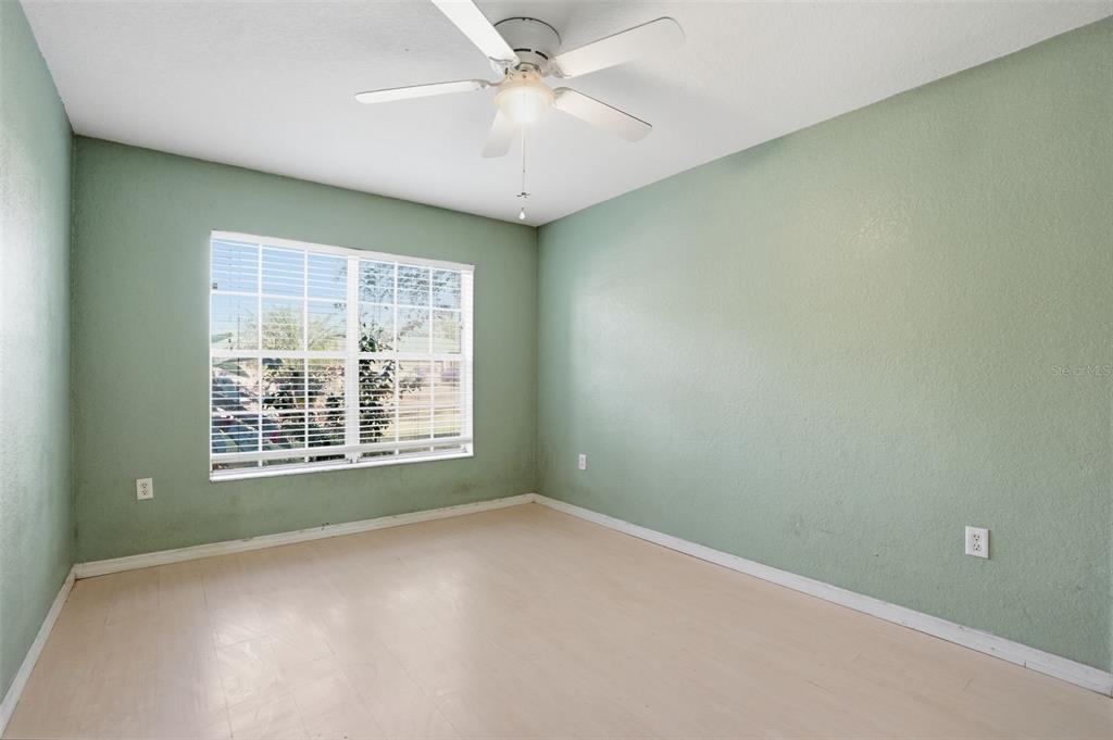 10490 Mayflower Road Spring Hill, FL 34608 - Photo 17 of 35 a view of an empty room with a window