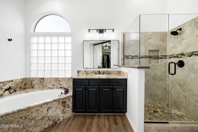 a bedroom with a bed and a baby