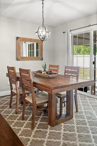 a kitchen with stainless steel appliances granite countertop a stove a microwave and cabinets