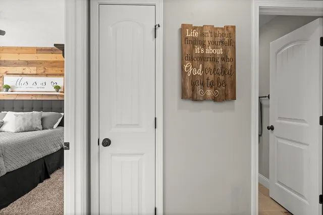 a bathroom with a double vanity sink a mirror and a shower