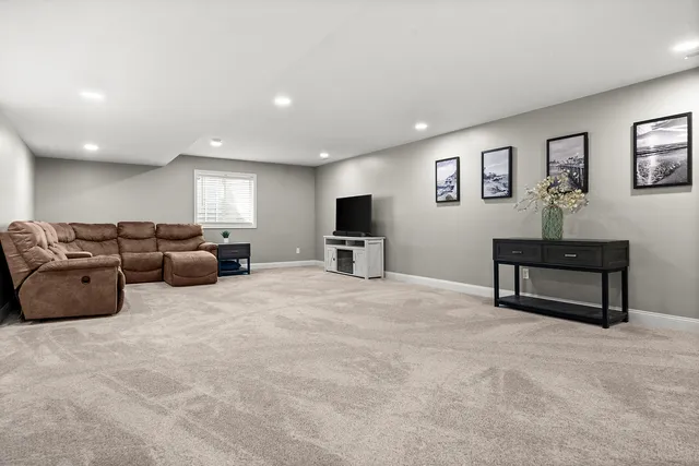 a bathroom with a sink a toilet and shower curtain