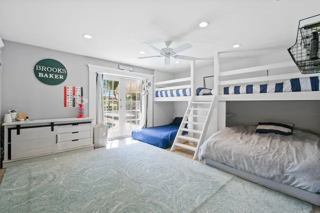 a bed room with a bed and a window