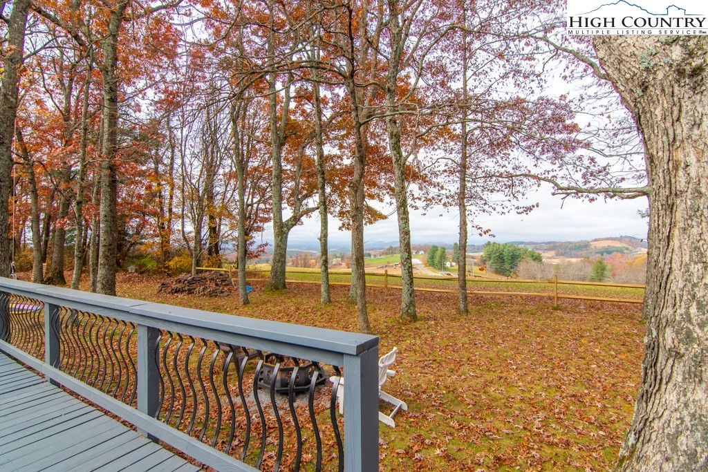 8877 Glade Valley Road Ennice, NC 28623 - Photo 46 of 49 a view of outdoor space with trees