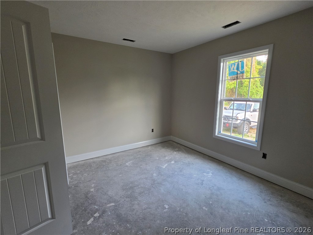 756 Jordan Road Autryville, NC 28318 - Photo 30 of 34 a view of an empty room with a window