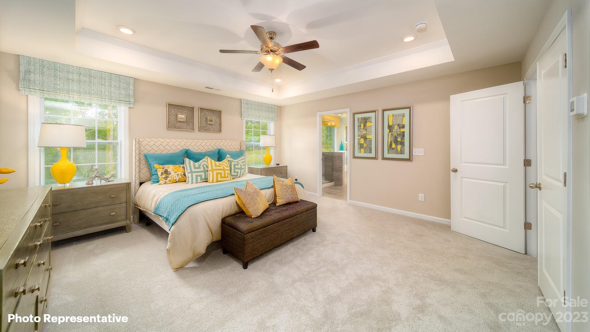 310 Streamwood Road Troutman, NC 28166 - Photo 27 of 35 a bedroom with a bed couch and window
