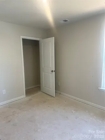 an empty room with closet
