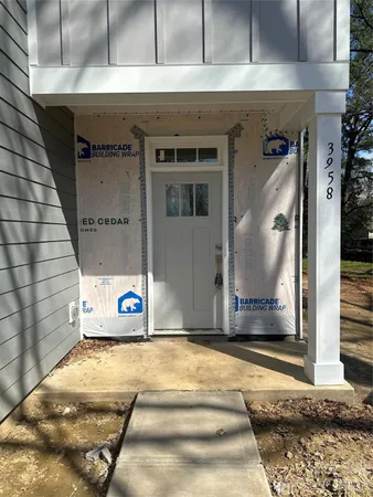 a front view of a house with a garage